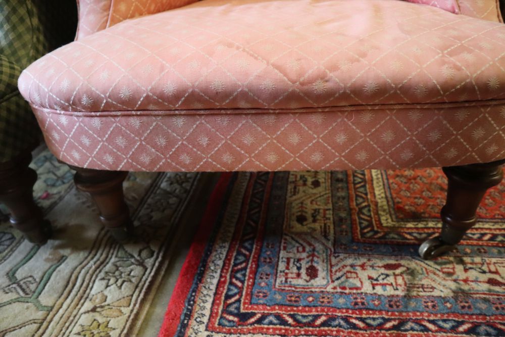 A pair of Victorian mahogany upholstered armchairs, width 72cm depth 90cm height 94cm